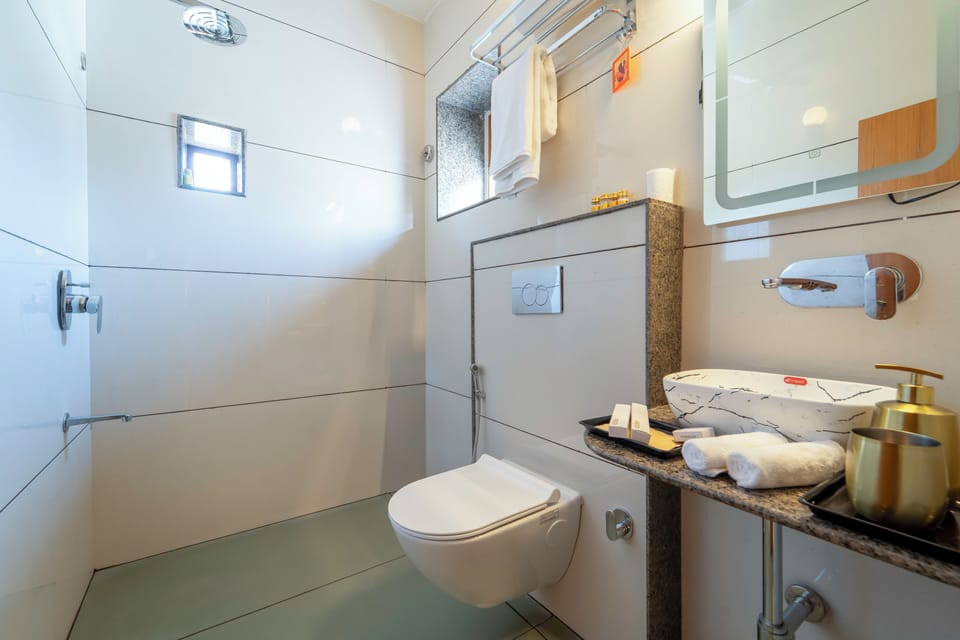 Deluxe Room | Bathroom | Slippers