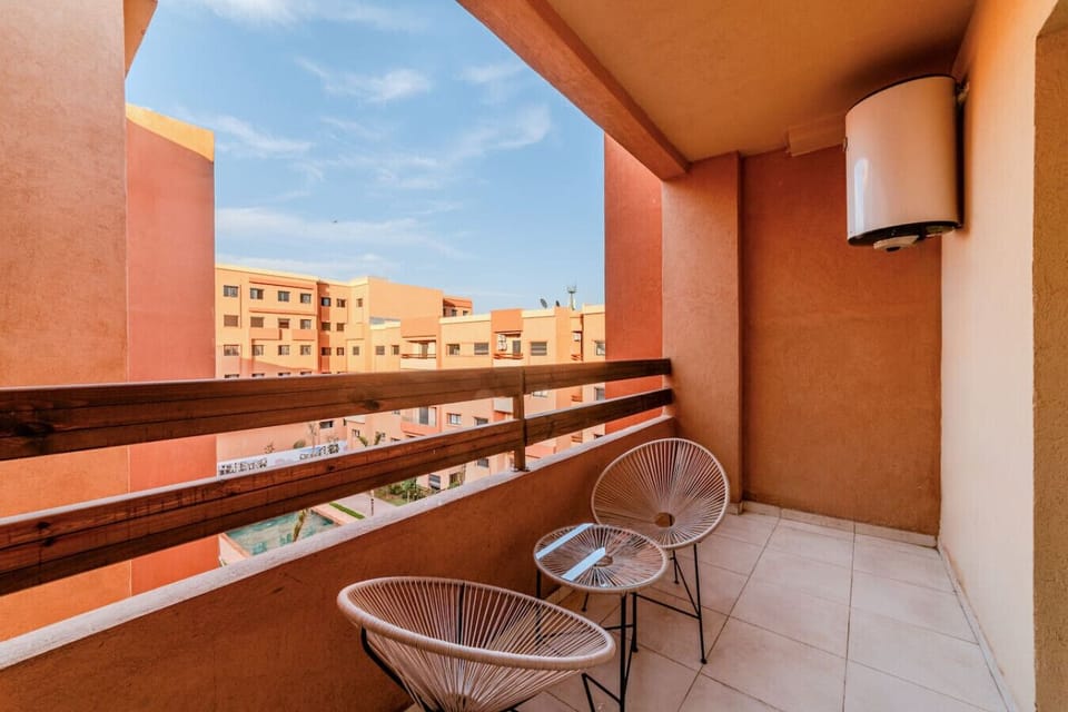 Enjoy pool views from your private balcony — the perfect place to relax anytime.