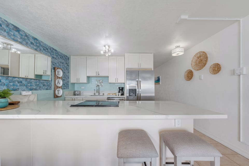 Spacious kitchen featuring a breakfast bar, modern appliances, and open layout for easy entertaining.