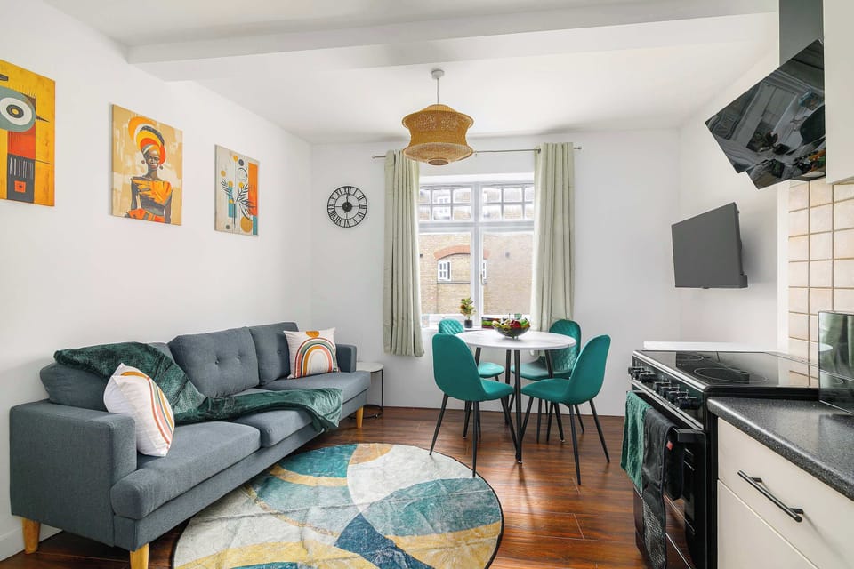 Light-filled open-plan living, dining and kitchen space with stylish decor