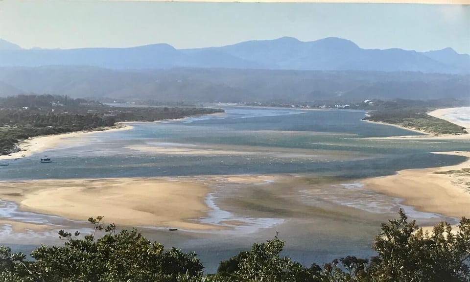 Beach nearby, white sand, beach towels