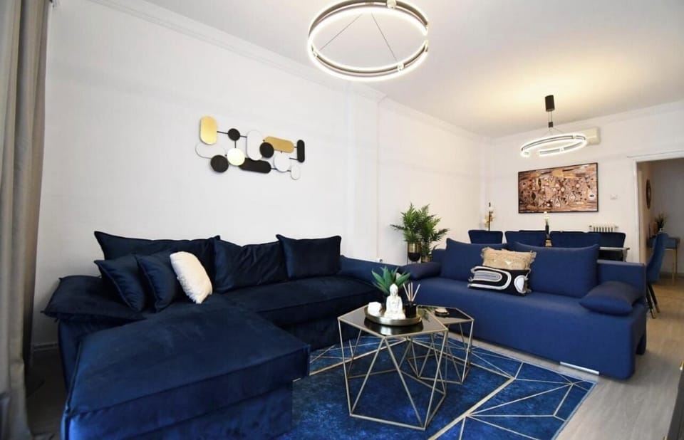 Apartment, 3 Bedrooms | Living area | Flat-screen TV