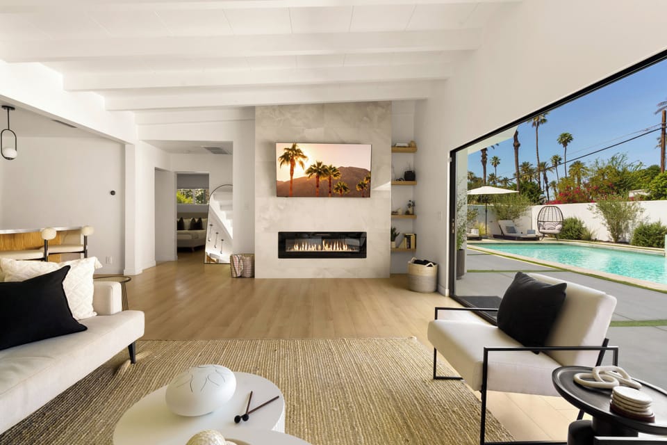Our home is a lovely getaway for those looking for relaxation.  Main room family room features TV and fireplace and large sliding door.