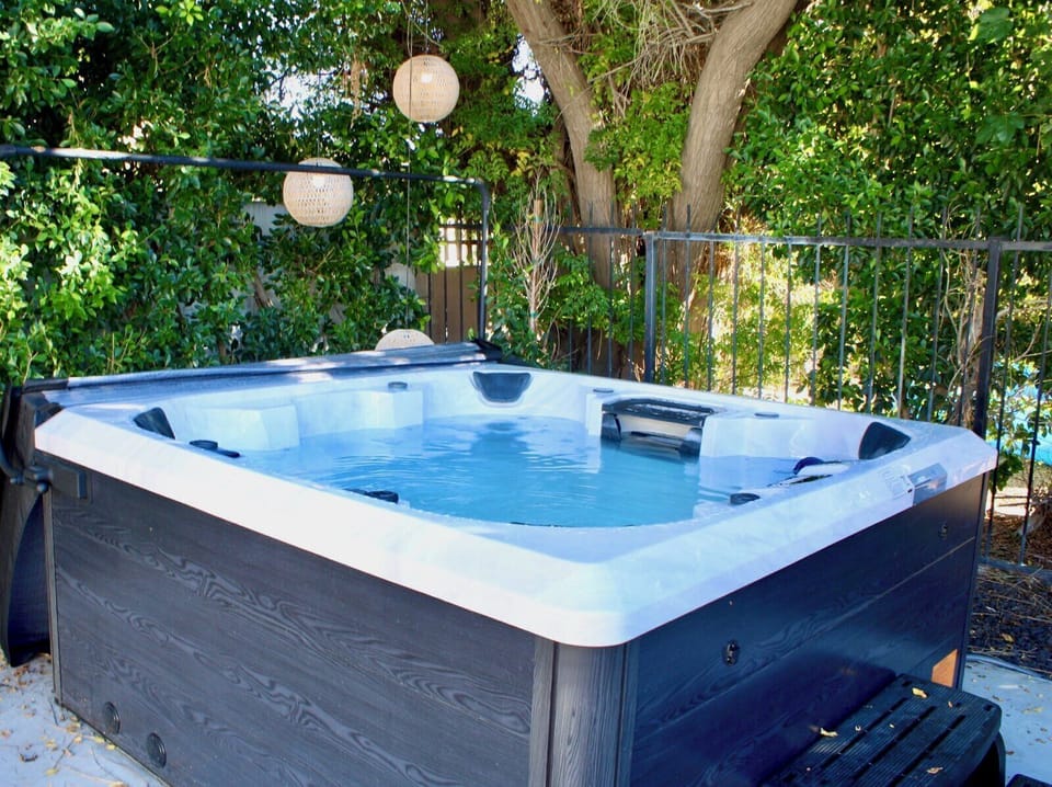 RECENTLY ADDED -- the hot tub!  Bellagio Luxury Leon hot tub fits 4-6 people easily.