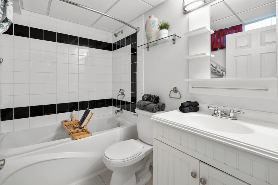 Spa-style bathroom with a soaking tub and fluffy towels unwind in comfort.