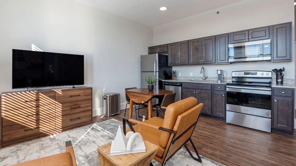 Studio, 1 Queen Bed (0 Bedroom) | Living area | 50-inch Smart TV with digital channels