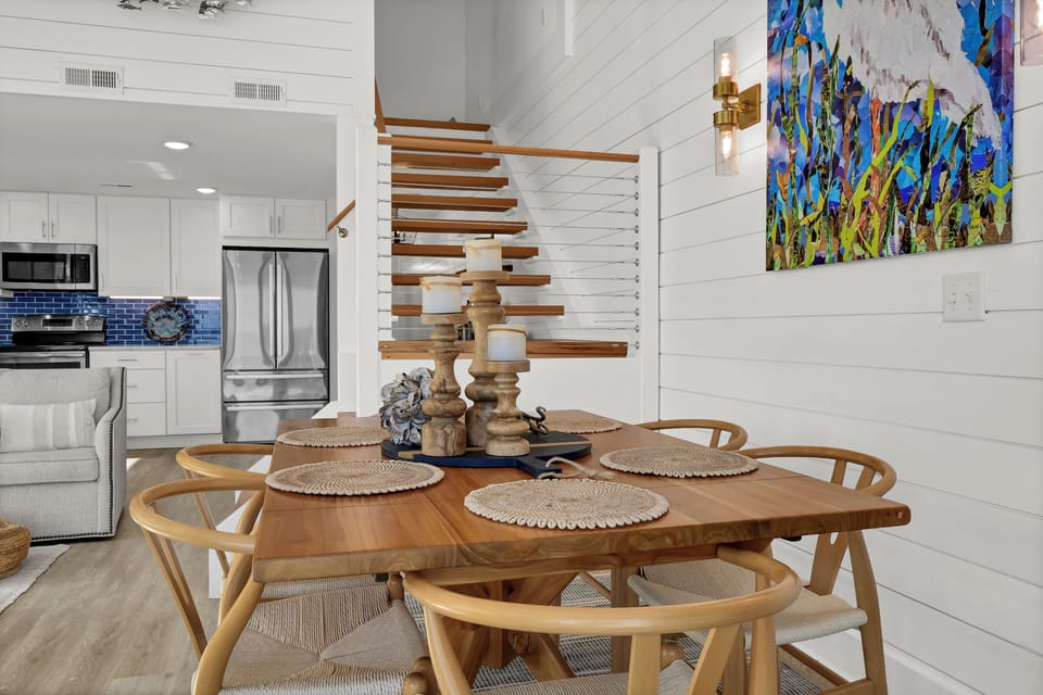 Seaside dining space with seating for the whole group