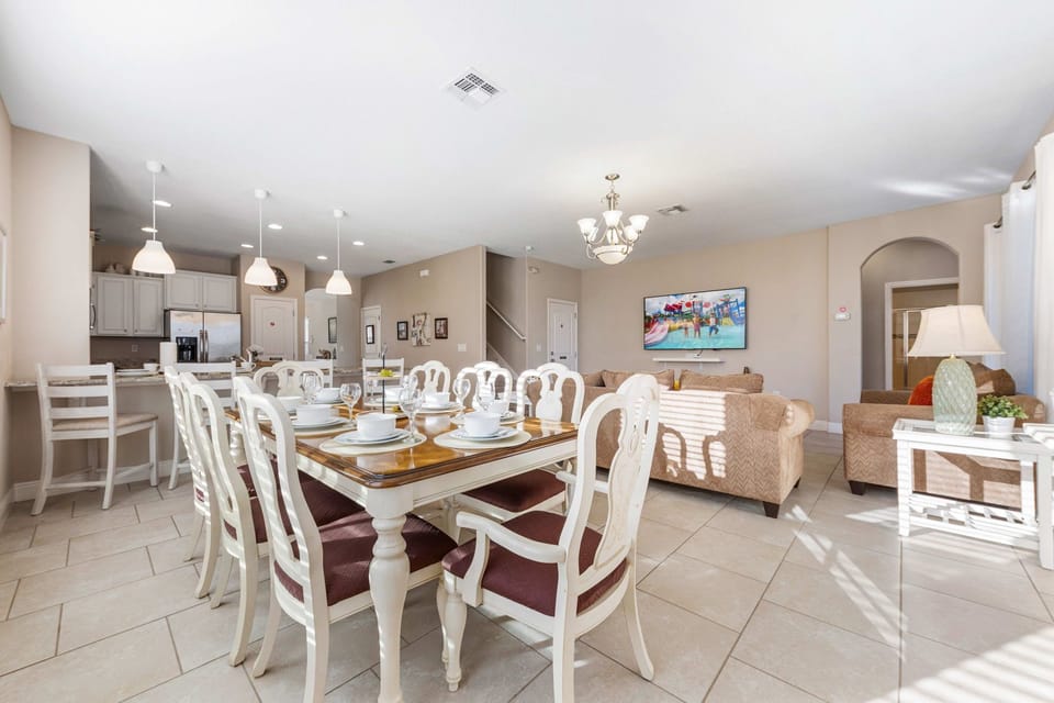 Open-plan dining area connecting the living room and kitchen.