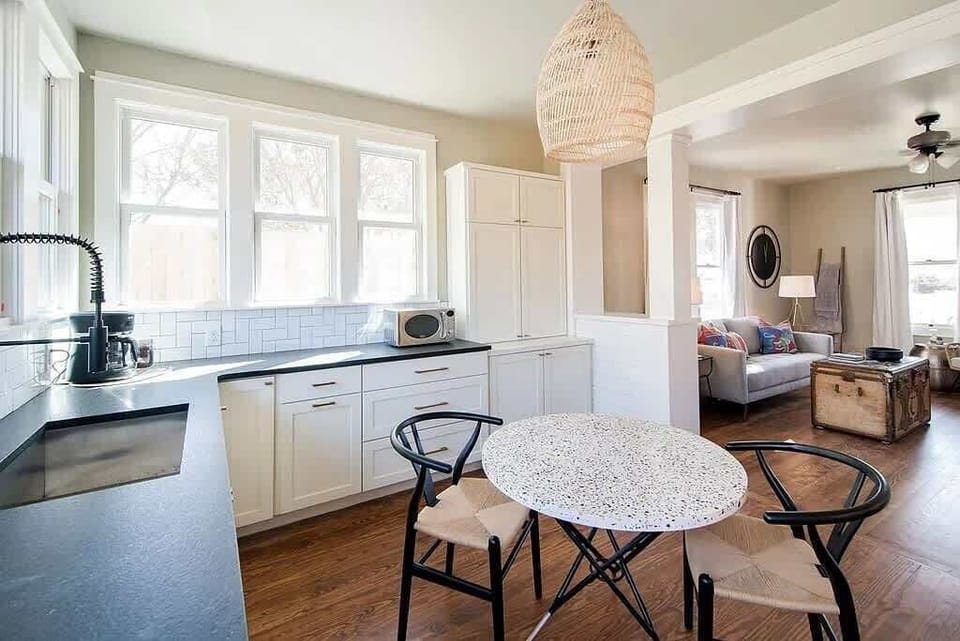Kitchen: Bright and inviting space with sleek finishes, perfect for culinary adventures!