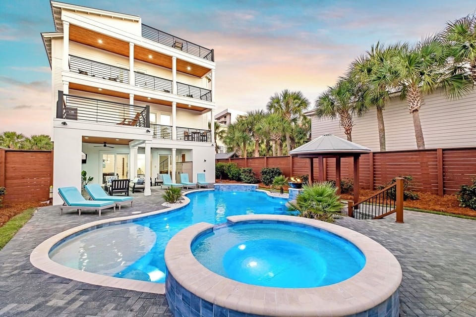The Ivory Rose—your luxury beach escape that SLEEPS 26! Less than 80 yards to PRIVATE beach access with a FREE 6-seat golf cart. Enjoy the heated pool, swim-up bar, rooftop terrace with Gulf views, outdoor kitchen, and stunning coastal design.