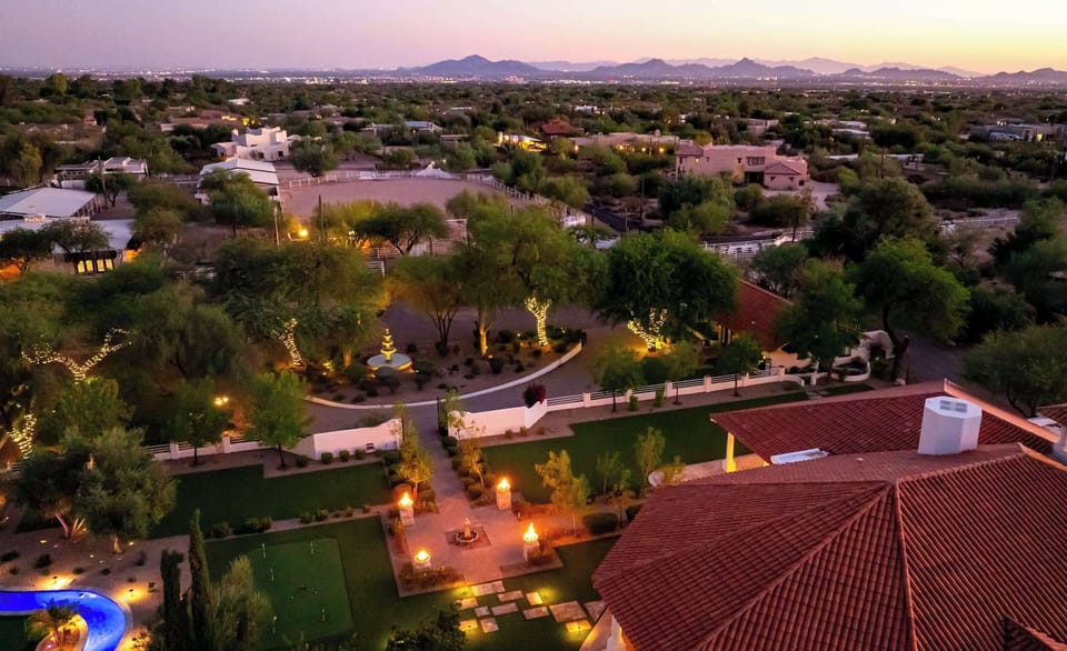 Magical evening lighting transforms the backyard