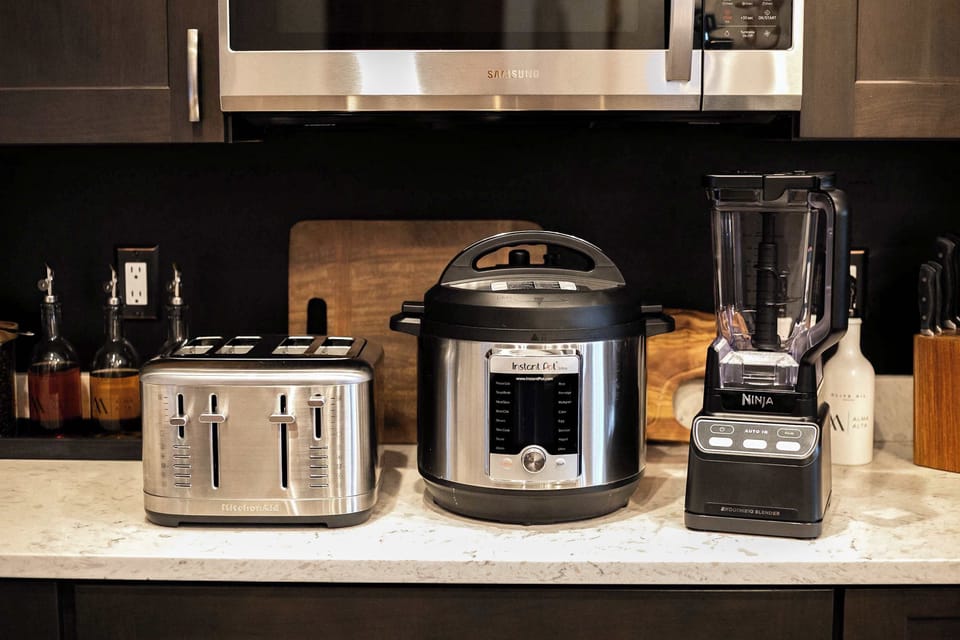 Extra appliances including Instant Pot, blender, and toaster.