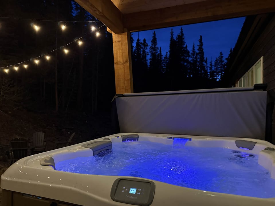 Private hot tub for relaxing after skiing or hiking.