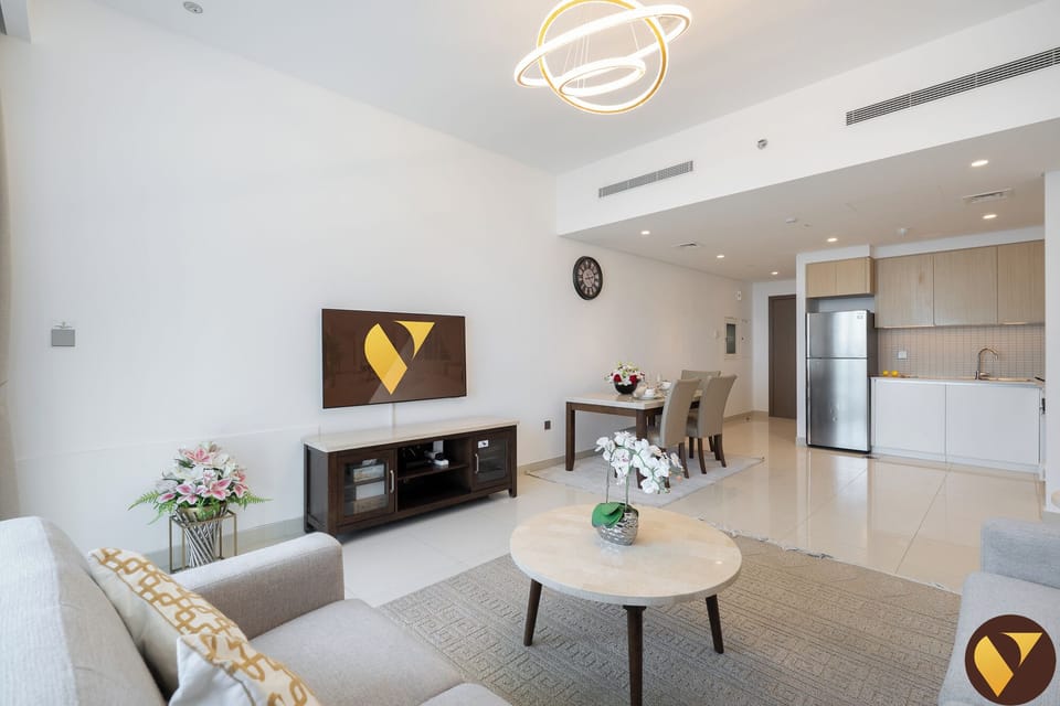 Luxury Apartment, Balcony, Canal View | Living area | 65-inch Smart TV with cable channels