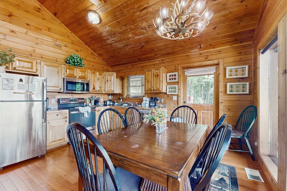 Bright, inviting space for family feasts, with rustic charm and nature views!