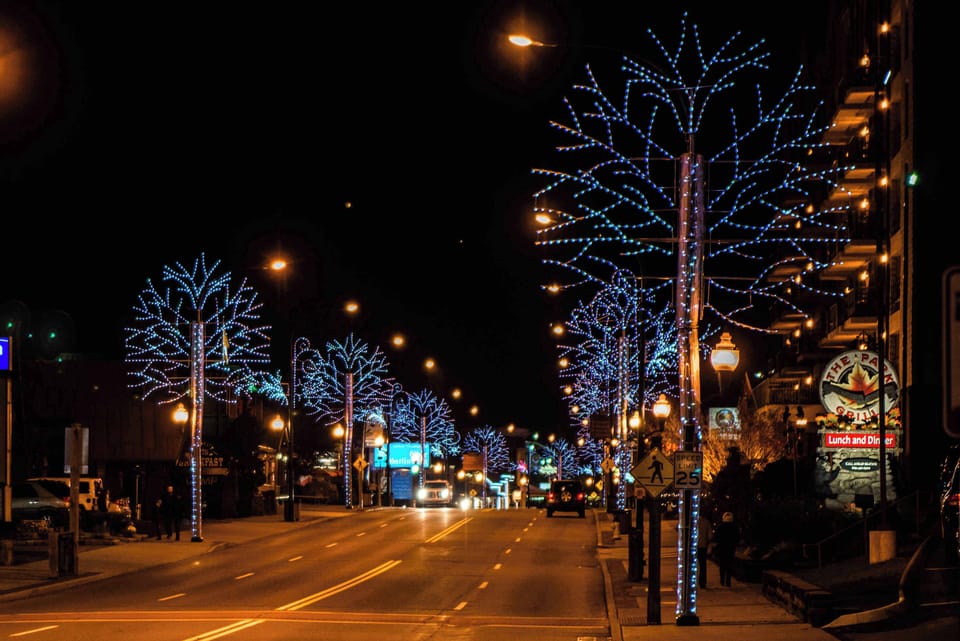 Stroll along a dazzling street lined with twinkling lights and festive charm!