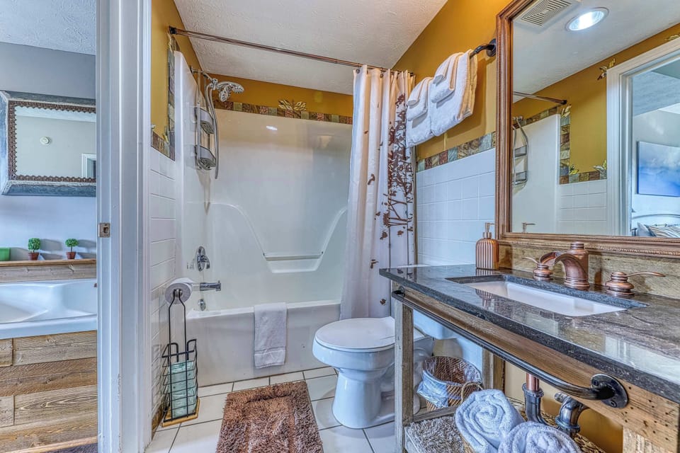 Spa-like Retreat, refresh in this stylish bathroom with a spacious tub and chic decor!