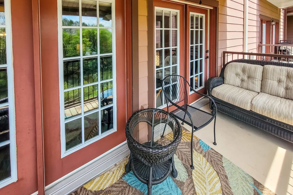 Unwind on the terrace, enjoying lush views and vibrant outdoor seating!