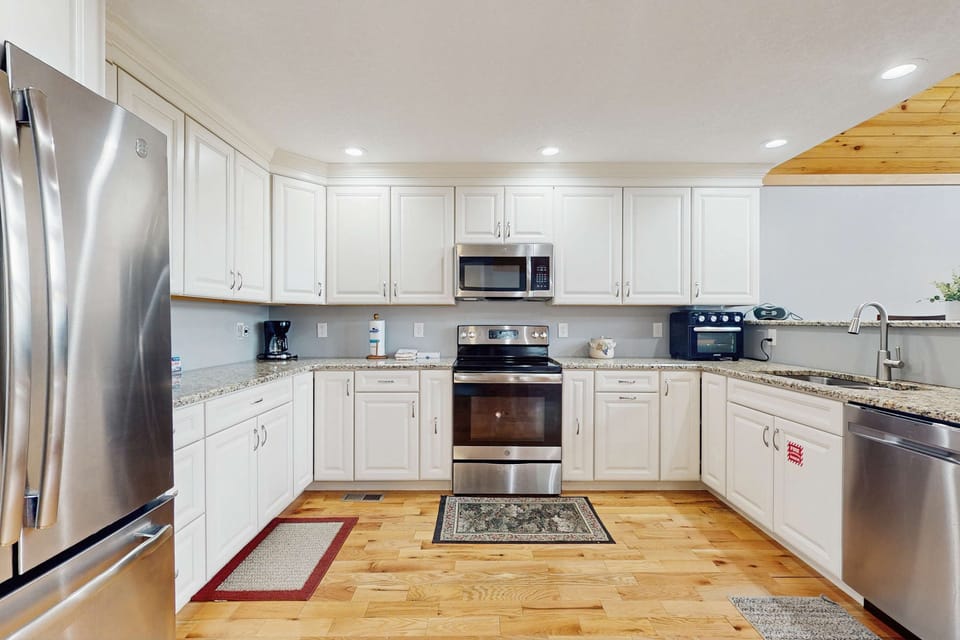 Cook up a storm in this modern kitchen with sleek appliances and ample space!
