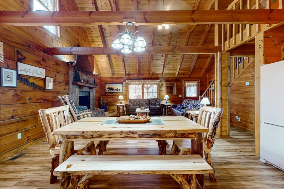 Gather around the handcrafted table for memorable meals in a stunning woodsy retreat!
