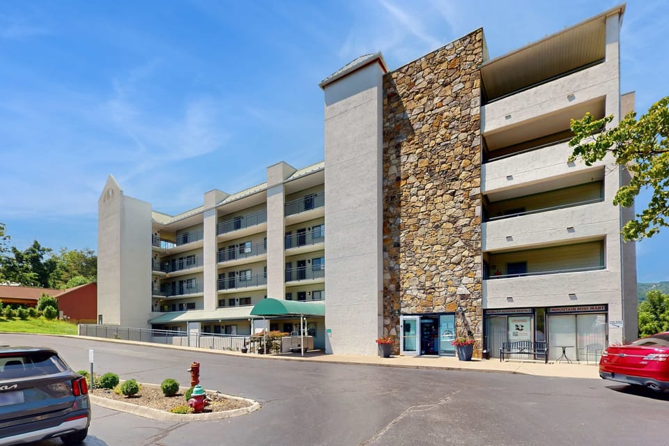 Discover the stunning stone facade and mountain views just steps from your adventure!