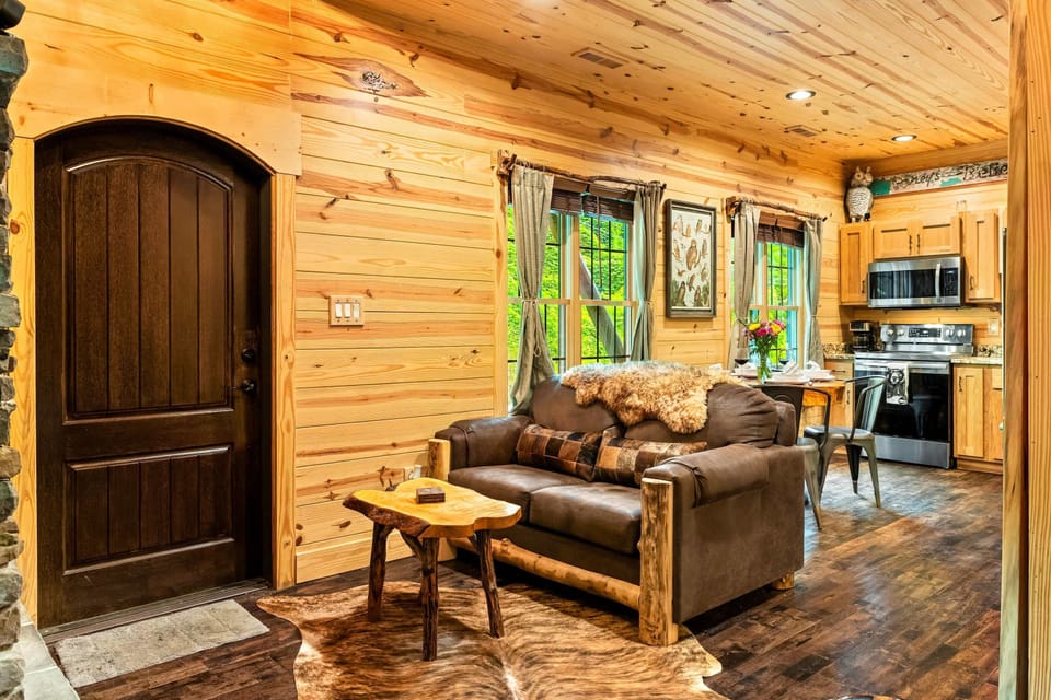 Experience nature's beauty through large windows and rustic charm in every detail!