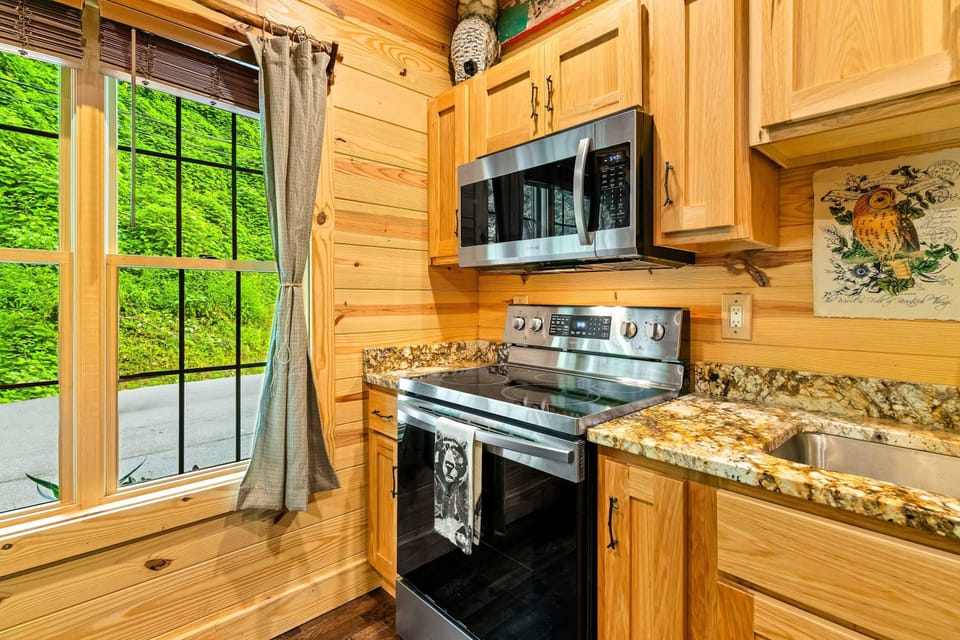 Modern appliances meet rustic charm, perfect for culinary adventures!