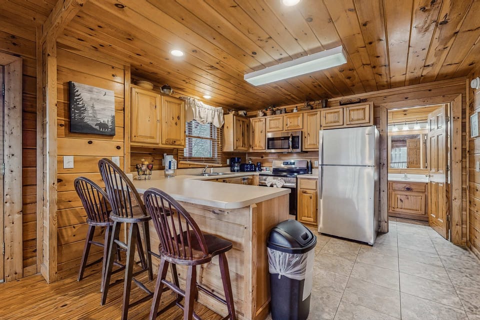 Pure kitchen paradise awaits. And, whip up delicious meals in this inviting, cabin-style kitchen!