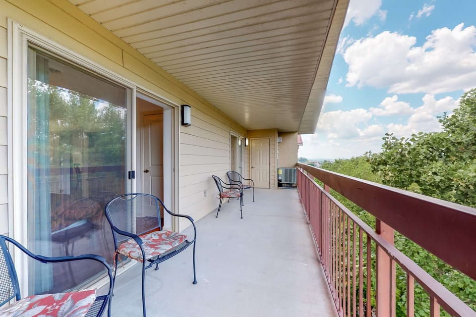 Enjoy breathtaking views from this inviting outdoor space with stylish seating!