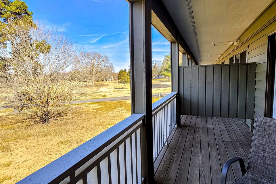 Private balcony with seating & open views. Enjoy morning coffee and sunsets. Great escape for couples, long stays, peaceful retreat, scenic outlook, fresh air.