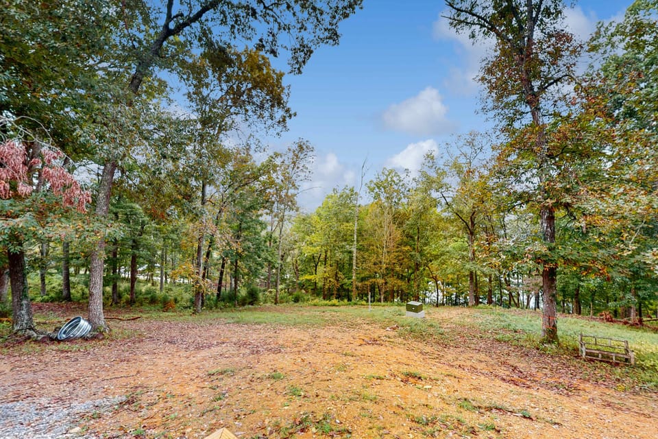Secluded wooded setting with scenic clearing. 