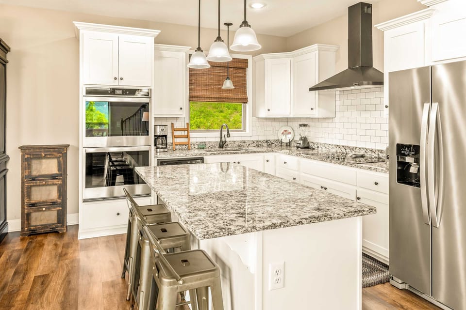 Whip up culinary delights with modern appliances and stunning granite countertops!