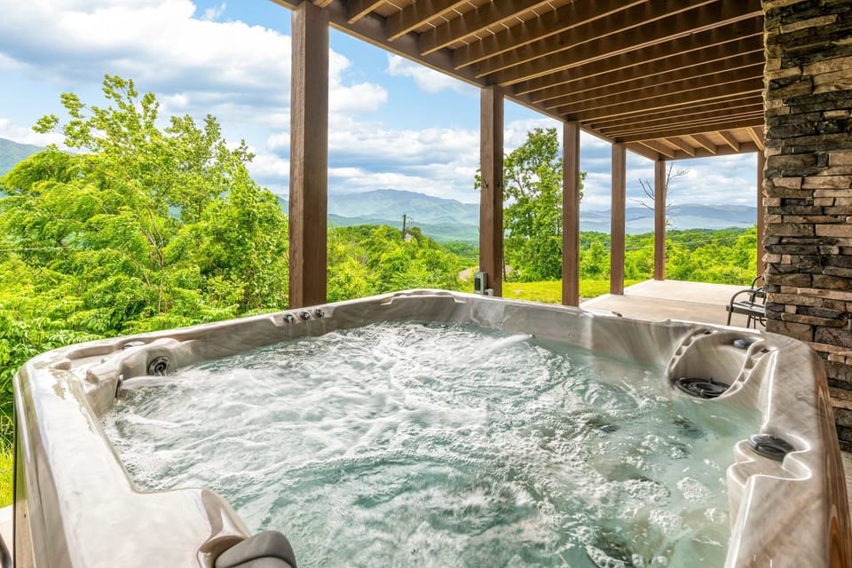Hot tub oasis awaits. And, relax in the bubbling hot tub with breathtaking mountain views around you!