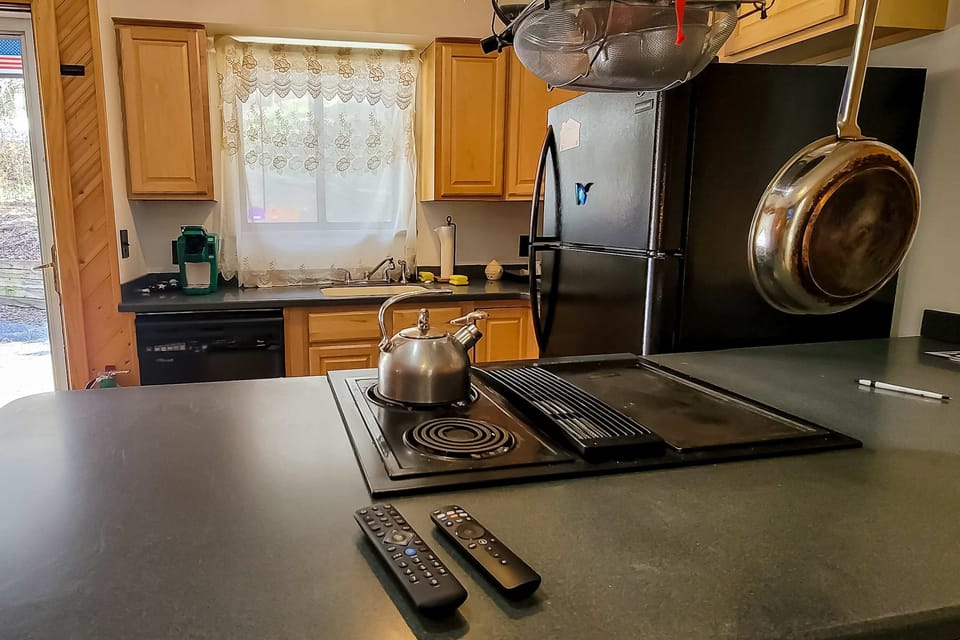 Cook up a storm in this well-equipped space with ample natural light!