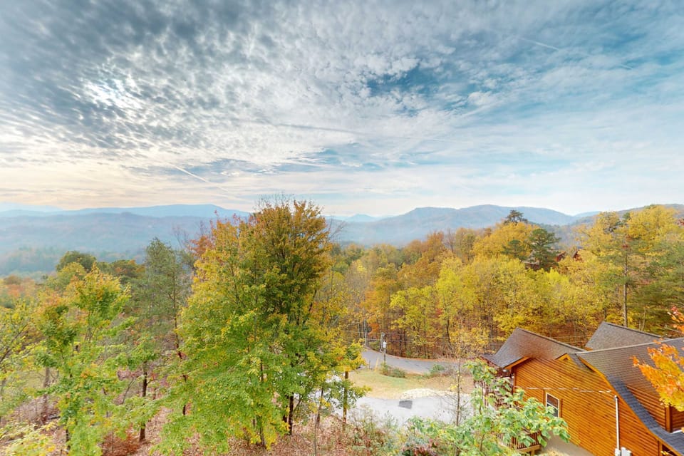 Bask in stunning mountain vistas and vibrant fall foliage from your private balcony!