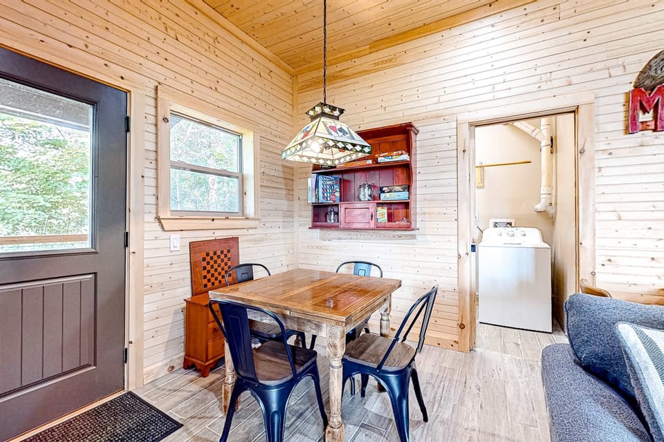 Dining Nook, gather around the charming table beneath a stained glass light for fun meals and games!