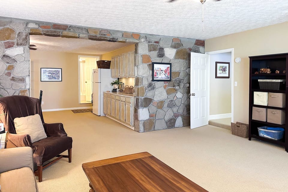 Inviting space with stone accents, perfect for relaxation and fun gatherings!