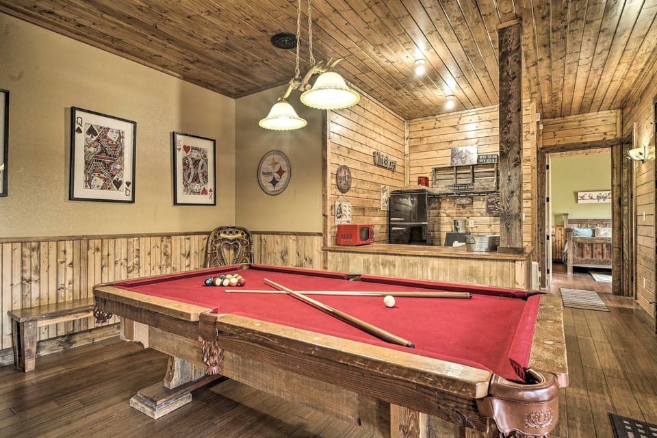 Unwind with friends over a classic pool table in this charming, rustic retreat!