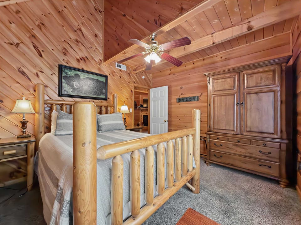Rustic Retreat, enjoy serene nights in this beautifully crafted log bedroom with nature-inspired decor!