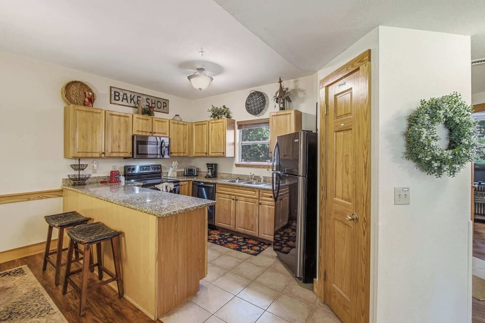 Cook up memories in this charming space with modern appliances and inviting decor!