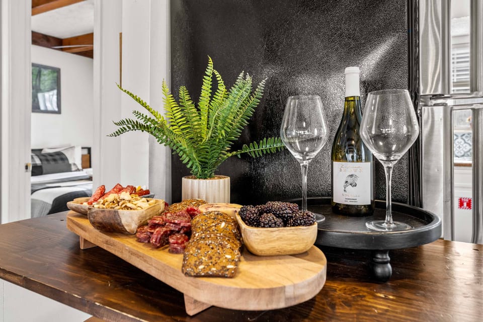Welcome Snack Bar, indulge in a delightful spread with wine and treats just steps away!