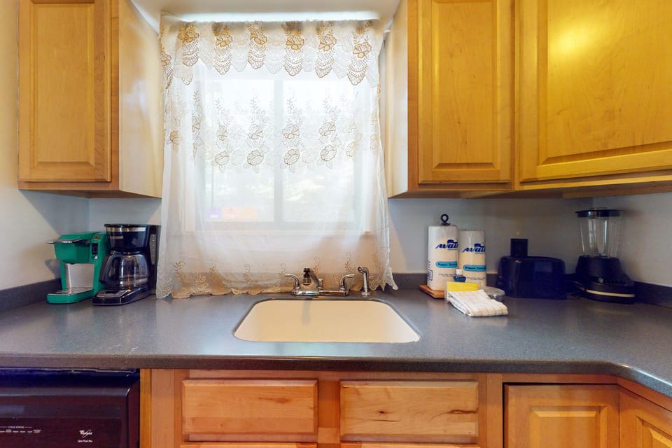 Bright and inviting space with modern appliances and charming accents!