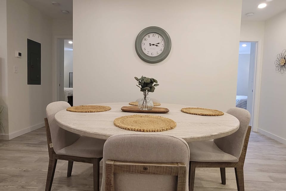 Gather around the elegant circular table for memorable meals and laughter!