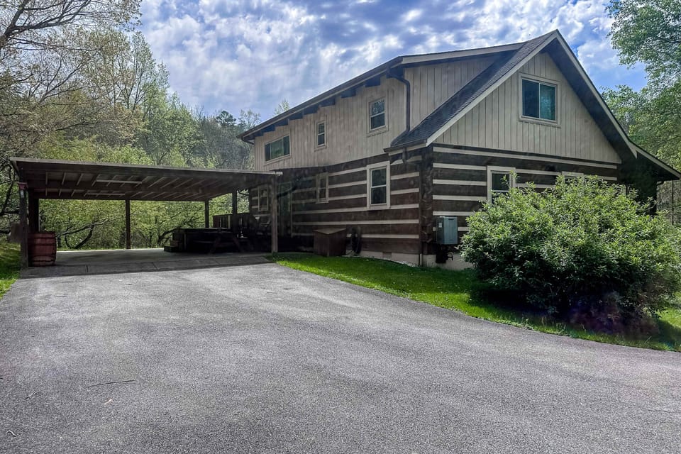 Experience nature's embrace in this stunning log cabin with ample space for fun!