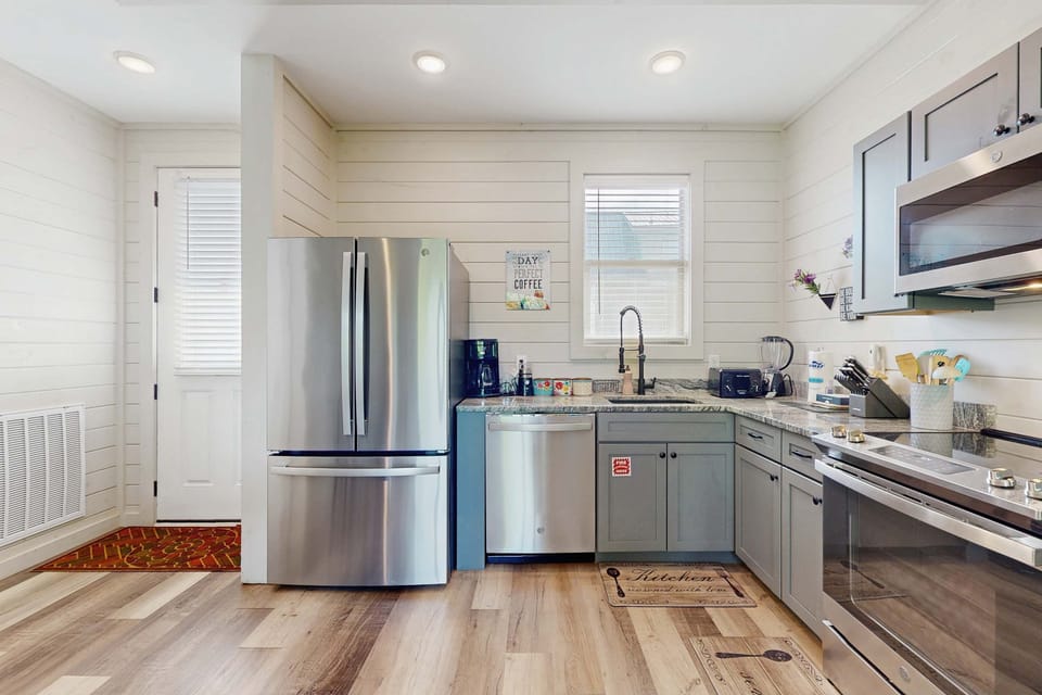 Modern appliances and charming decor await your culinary adventures!