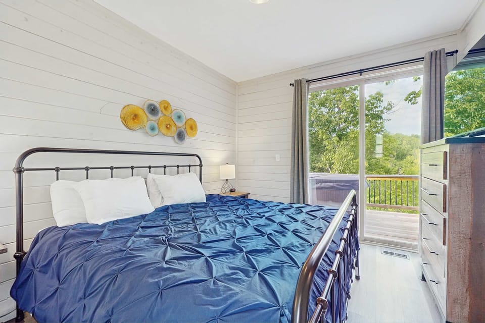 Bedroom retreat awaits. A sunlit haven with scenic views and stylish decor for your perfect getaway!