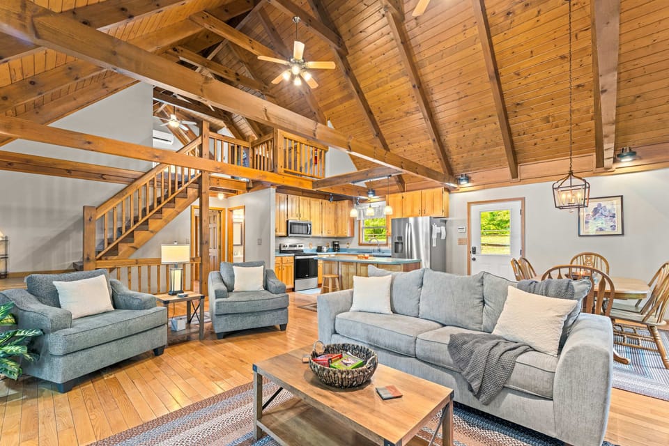 Sunlit space with stunning wood beams and inviting seating for lively gatherings!
