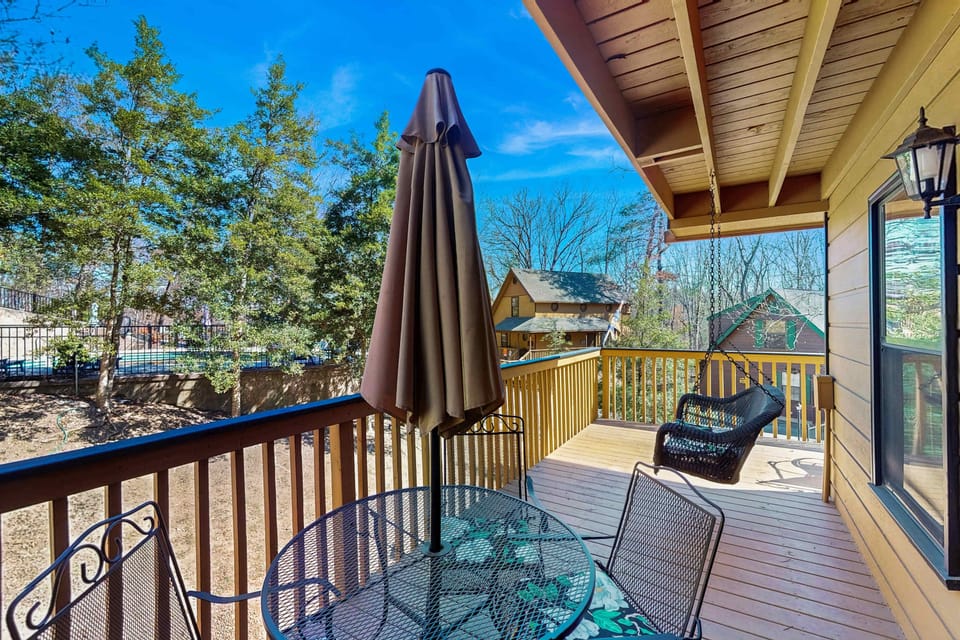 Private Balcony, unwind in your swing chair and savor breathtaking views of lush woodlands!
