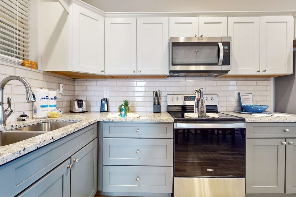 Kitchen delight awaits. Complete with modern appliances and elegant granite countertops make cooking a joy!