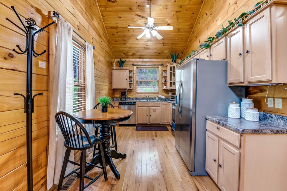 Bright wood accents and modern appliances create a fun cooking space for culinary adventures!